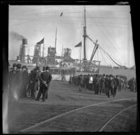 People wait for the ferry to Oakland, San Francisco, 1898