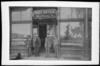 Charles Robb, F. S. Putnam, Winn J. Sanborn and Charles Hawthorne stand in front of Downey Avenue Station A Postoffice, Los Angeles, about 1889 or 1890