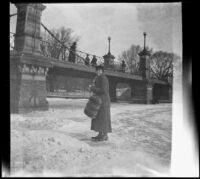 Woman ice skates on the frozen pond in the Public Garden, Boston, 1914