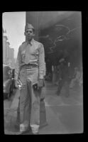 PFC Jackie Foreman stands outside of Clifton's [Pacific Seas] Cafeteria, Los Angeles, 1943