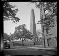 Mertie West poses in front of the Bunker Hill Monument, Boston, 1947