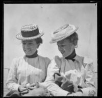 Nella West sits next to Daisy Conner, Santa Catalina Island, about 1901