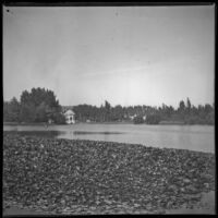 Lake with pagoda on the opposite shore at Lincoln (Eastlake) Park, Los Angeles, about 1900