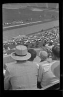 Spectators watch the preparations for a track event at the Olympic Games, Los Angeles, 1932