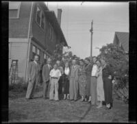 H. H. West's wife, siblings, sisters-in-law, son, and nephew stand in