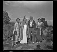 Agnes Whitaker, Josie Shaw, Forrest Whitaker and Mertie West posing in their "formal" attire, Mono County, 1941