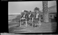 Zetta Witherby, Dode Witherby and Mertie West sit on the veranda at Furnace Creek Inn, Death Valley National Park, 1947