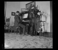 Wayne West plays Nella West's piano, Los Angeles, about 1900