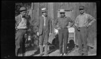 Glen Velzy, Charles Stavnow, Cleo Swain and Chet Egdell at Grays Meadows camp ground during a trip to Gardner Creek, about 1919