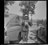 Wayne West poses with the 3 trout he caught, Big Bear Lake, 1944