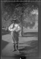 H. H. West stands on the golf course at Sunset Canyon Country Club