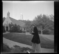 Woman walks up to the Wee Kirk o' the Heather for the Wedding of Sam Longstreet and Cosette Pohle, Glendale, 1939