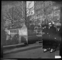 Two women walk down Fifth Avenue past the New York Public Library, New York, 1914