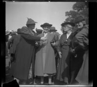 Alice Baltzell Tibbetts speaks to Leta French, Laura Bell Gibson, and another woman at the Iowa Picnic in Lincoln Park, Los Angeles, 1939