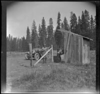 Harry Schmitz and Wilfrid Cline, Jr. stopping for a drink of water at Bear Flat, Trinity County, 1917