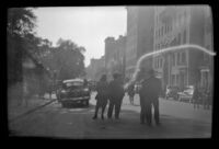 People stand in the middle of Beacon Street during an event near Boston Common, Boston, 1947