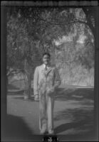 Wright Prickett, Jr. poses in front of a putting green at Sunset Canyon Country Club, Burbank, about 1930