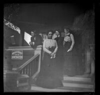 Edwin Emery, Nella West, Mertie Whitaker, and Ellen Lorene (Pinkie) Lemberger stand on the porch of 240 South Griffin Avenue, Los Angeles, 1901