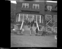 Chalet at Columbia Icefield with Mertie West and others on the steps, Alberta, 1947