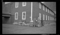 Native Americans selling souvenirs at the dock in Chatham, Sitka, 1946