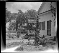 Aage V. Berg's home and sign, viewed from the side, San Jacinto, 1942