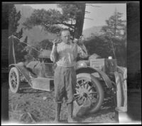 H. H. West poses with trout, Mammoth Lakes vicinity, 1915