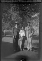 Will H. Shaw, H. H. West, Jr. and Wright Prickett, Jr. pose by the golf course at Sunset Canyon Country Club, Burbank, about 1930