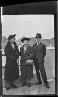 Mertie West, Zetta Witherby and Wes Witherby pose for a photograph at the Boulder Dam, Boulder City vicinity, 1939