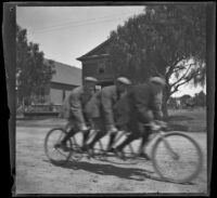 Men ride on a three-seat tandem bicycle, Los Angeles, 1897