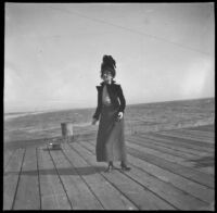 Pinkie (Ellen Lorene) Lemberger stands on the pier, Santa Monica, about 1900 or 1901