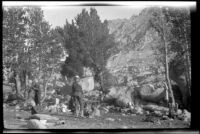 Members of H. H. West's camping party mill about their campsite at Bullfrog Lake, Independence vicinity, about 1919