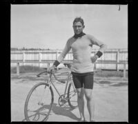 Guy West stands with his bicycle, Santa Monica, 1901