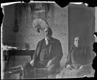 George M. West and Minnie West pose in their parlor on South Workman Street, Los Angeles, 1894