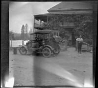 Wilfrid Cline, Jr. standing outside a hotel in Montgomery Creek, Shasta County, 1917