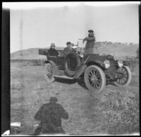 Dave F. Smith, H. H. West and Dr. F. S. Hardin in H. H. West's Buick, Gorman vicinity, circa 1910s