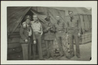 Charles Glenn, H. H. West, Jr., Harold Brown, David Sparks and Herman Schultz pose in front of the barracks (photo, recto), Camp Murray, 1941 or 1942