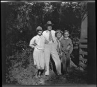 Mertie West, H. H. West, Sr., Nina Meyers and H. H. West, Jr. pose while visiting Matilija Creek, Ojai vicinity, about 1925