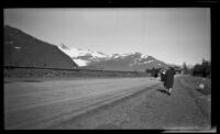 Mertie West walking down the road towards Whittier depot, Whittier, 1946