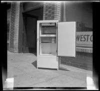 Woodlin electric refrigerator, viewed from the front with its door open, Los Angeles, 1948