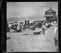 People on the beach with the camera obscura in the background, Santa Monica, about 1895