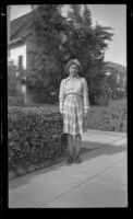 Dorothea Siemsen poses outside her family's home, Glendale, 1943