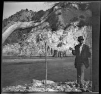 Mills Helen posing with a string of fish, Los Padres National Forest vicinity, about 1917