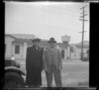 Fred Lemberger and his wife, Mary R. Lemberger pose in front of Walt Disney Studios, Los Angeles, 1940