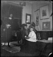 Annie M. Brain and Aileen Brain sitting in their home, Santa Monica, [about 1900]