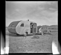 Forest Whitaker in the doorway of a a Main Line Silver Lark trailer during a trip from Los Angeles to Mexico, 1948