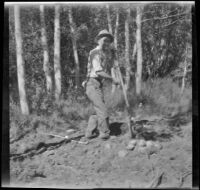 Forrest Whitaker digs while camping at Convict Lake, Mammoth Lakes vicinity, 1929