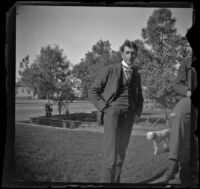 Arleigh Lemberger stands next to Wilson West, who sits on the West's front porch, Los Angeles, about 1899