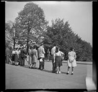 Visitors watch a guard patrol the Tomb of the Unknown Soldier, Arlington, 1947