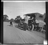 Elizabeth West plays in the road while Mary West watches, Mendocino County vicinity, 1915