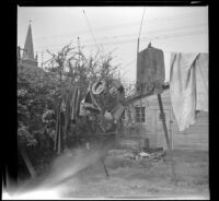 Clothing and gear airing out in the West's back yard, [Los Angeles], 1941